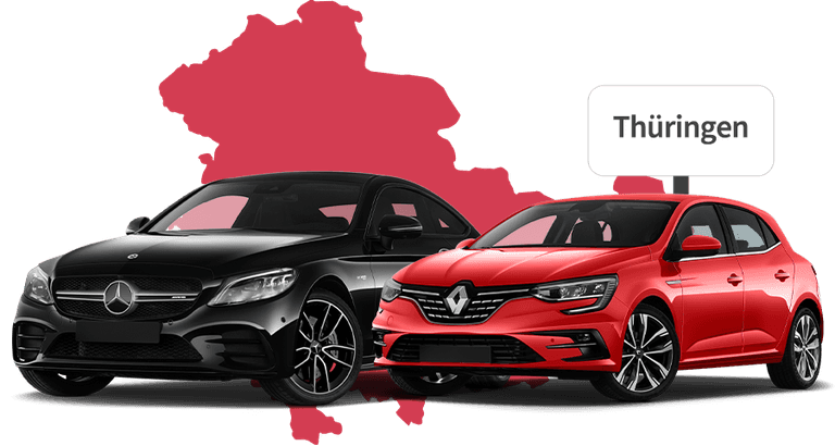 Ein Mercedes und ein Renault mit Thüringen Hintergrund