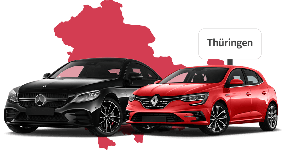 Ein Mercedes und ein Renault mit Thüringen Hintergrund