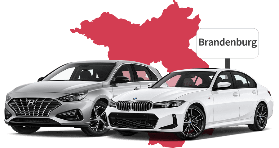 Ein Hyundai und ein BMW mit Brandenburg Hintergrund